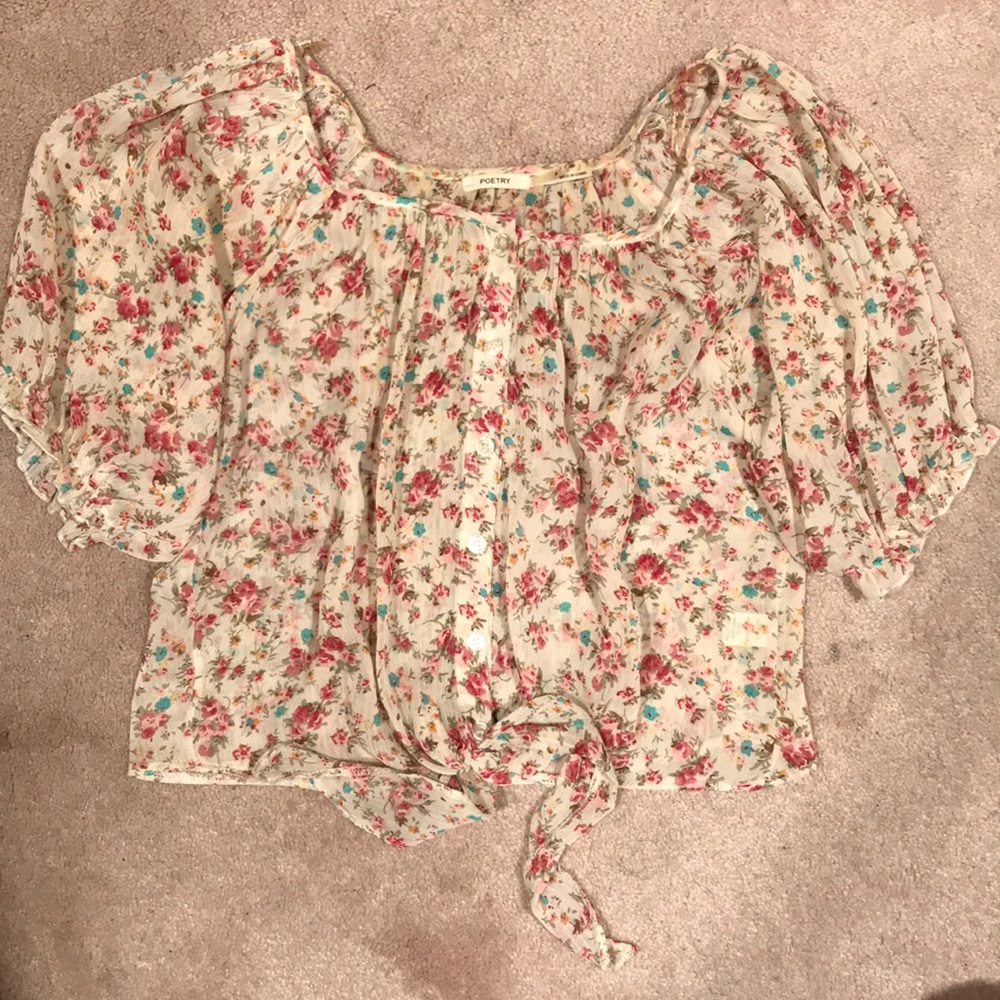 Button down floral top with tie at the bottom